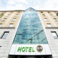 a hotel building with the word hotel on it at B&B HOTEL Wrocław Centrum