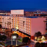 a large building with a sign on top of it at Four Points by Sheraton Los Angeles International Airport
