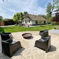 Luxe villa met geweldige omheinde tuin aan Veluwse bosrand