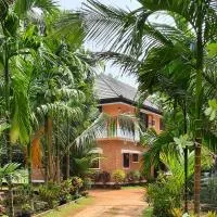 Joan's Homestay, hotelli kohteessa Vaikom