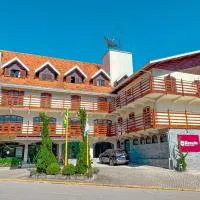 Hotel Euro Suite Campos do Jordão، فندق في كامبوس دو جورداو