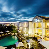 a view of a hotel with a swimming pool at Protea Hotel by Marriott Knysna Quays