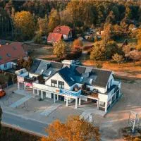 Latarnik - luksusowe apartamenty w Stilo, hôtel à Osetnik