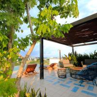 Spacious Studio, incredible rooftop with sea view，普拉亞德爾卡曼Playa del Carmen National Airport - PCM附近的飯店