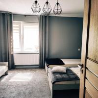 Samodzielne mieszkanie na parterze domu – hotel w mieście Gardna Wielka