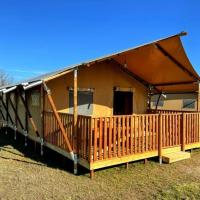 Glamping tent with kitchen and bathroom, on a holiday park on the IJsselmeer