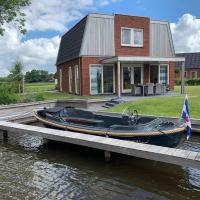 Spacious holiday home with private jetty right on the water