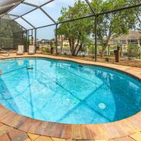 Gulf access, Heated Pool, outdoor kitchen, firepit & dock - Waterfront Paradise