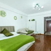 Dalian Hong Xi Yuan Apartment Wanda Plaza, hotel i Dalian