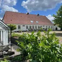 Landligt ophold på Midtgård, hótel í Vamdrup