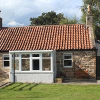 Carpenters Cottage- coastal stay with garden