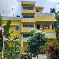 Balurghat Hotel KOKORO Farmhouse, khách sạn ở Bālurghāt