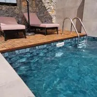 Jennas House, hotel i Arakapas