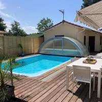 !Villa 4*MiMiZaN/Piscine chauffée/Wifi/Plage à 5mn/Clim, Hotel in Mimizan
