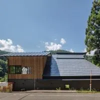 無料温泉券付き 最大12名 バーベキュー可能な一棟貸切宿 奥阿賀七名庵らくら キッチン洗濯機完備, viešbutis mieste Aga
