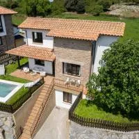 Wishome - Bonita casa con jardín y piscina, a unos minutos de Cala Berellín, hotel en Prellezo