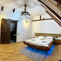 Casa de Lemn Arpasu de jos, hotel sa Arpaşu de Jos