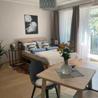 Apartment Upeņu, отель в Риге, в районе Пурвциемс