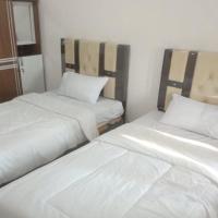 OYO 93088 Celine Home Syariah, hotel near Sultan Syarif Kasim II International Airport - PKU, Parit