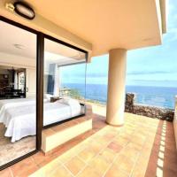 Three Bedrooms Suite with Sea View,heated pool, first line of the Atlantic Ocean, hotelli kohteessa Los Realejos
