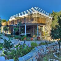 Eco Secluded hand built stone house in an oasis