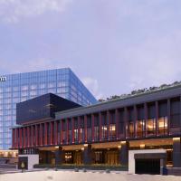 Hilton Bengaluru Embassy Manyata Business Park, хотел в Бангалор