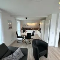 Helle, großzügige Ferienwohnung für 2 - 3 Personen mit Parkplatz + E-Ladestation in Buchholz, Nordheide, khách sạn ở Buchholz in der Nordheide