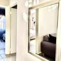 Central and peaceful 2-bedroom Apt #ZonaHomes, hotel berdekatan Grand Central Airport (Johannesburg) - GCJ, Midrand