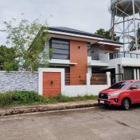 Home in Bacolod, ξενοδοχείο κοντά στο Αεροδρόμιο New Bacolod-Silay - BCD, Μπακολόντ