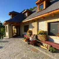 Casa cu șindrilă, хотел в Валени де Монте