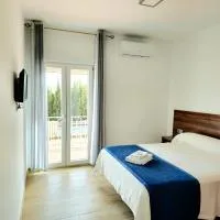 Hostal Restaurante el cruce، فندق في Padul