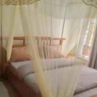 Room in Guest room - Charming Room in Kayove, Rwanda - Your Perfect Getaway、Kayoveのホテル