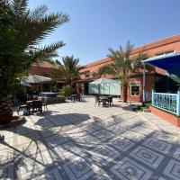 فندق ادوماتو ADOMATo HOTEl，Dawmat al Jandal的飯店
