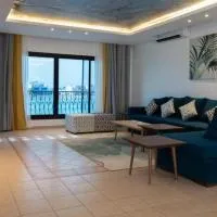 درة العروس خمس غرف وصالة مع بالكونة على شاطئ البرادايس - عوائل, hotel v mestu Durat Alarous