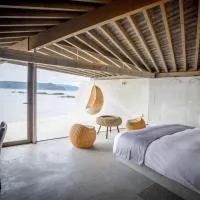 Amami में, होटल Denpaku The Beachfront MIJORA