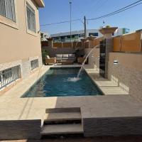 Spacieuse villa familiale avec piscine Founty, hôtel à Agadir (Swiss City)