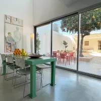 Design & art, patio with orange tree, near Seville, hotel a Carrión de los Céspedes