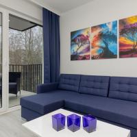 Dark Blue and Grey Apartment with Pastel Bedroom in Warsaw by Renters