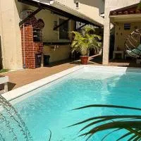 Casa Brisas Arembepe - arejada e aconchegante - litoral norte da Bahia - WiFi, hotel em Arembepe