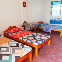 AUNORA Family Rooms, hotel en Talibon