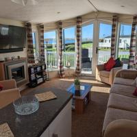 Lovely and Bright Caravan Haven Littlesea with views across the Fleet Lagoon