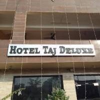 HOTEL TAJ DELUXE, Agra โรงแรมที่Rakabganjในอัครา
