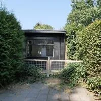 Gezellige Chalet met airco en vele faciliteiten!, hotel in Baarle-Nassau