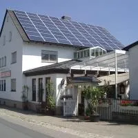 Gasthof Pension Grüne Au, хотел в Obernzenn