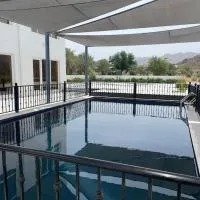 نزل الغيم -Cloudinn, hotel em Qārūt al ‘Ulyā