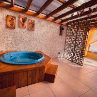 Magic house banheira de hidromassagem e piscina, hotel poblíž Letiště Rio Grande - RIG, Rio Grande