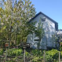 Tuinhuisje in het groen