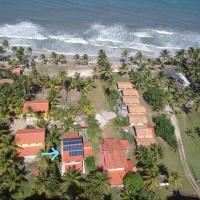 Casa de praia pé na areia: nos braços da natureza.