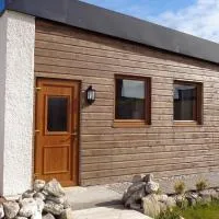 Viesnīca Holiday House with garden and sauna 10 pounds for Sauna pilsētā Durnesa