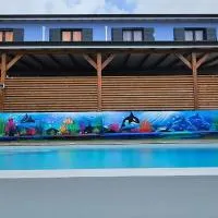 LES GITES D'ANGELE- Gîtes calme avec piscine, vue sur mer & jardin tropical, hotel in Vieux-Habitants